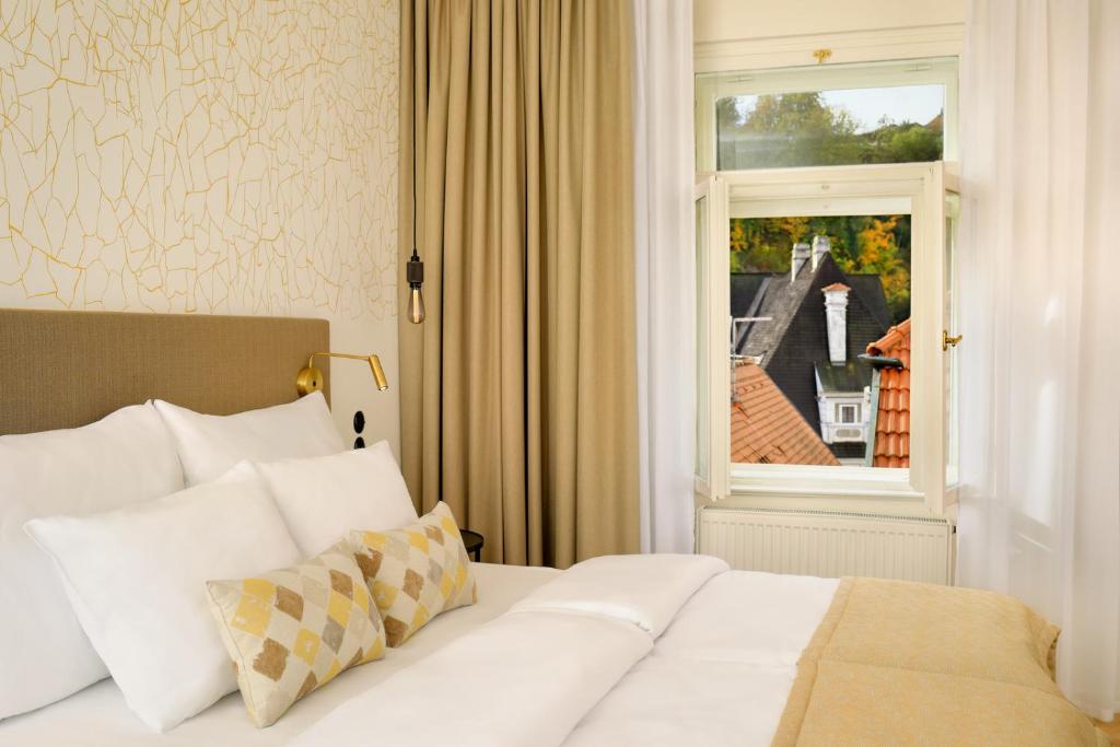 Postel nebo postele na pokoji v ubytování Hotel OLDINN