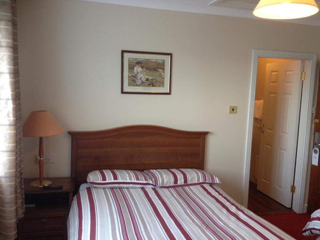 Letto o letti in una camera di Glendine Inn