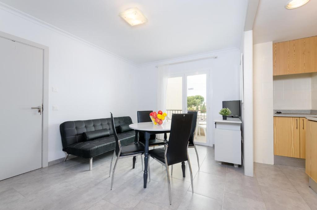 Kuchyň nebo kuchyňský kout v ubytování Alcudia Apartments