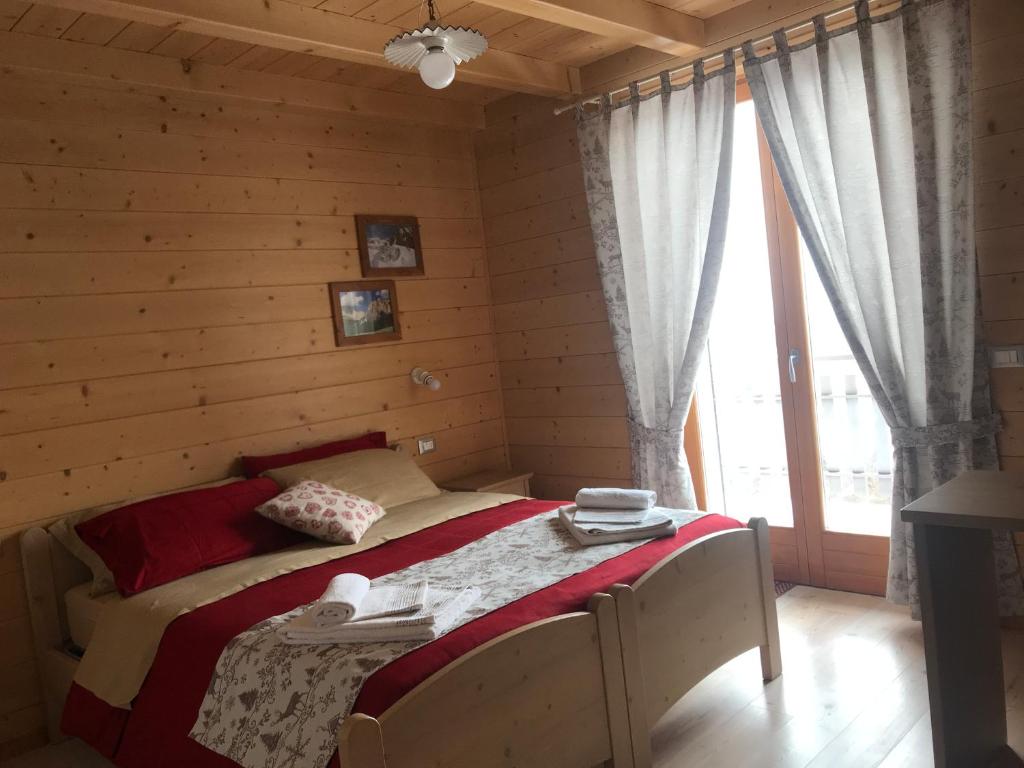 Łóżko lub łóżka w pokoju w obiekcie Locanda "Al Terrazzo"
