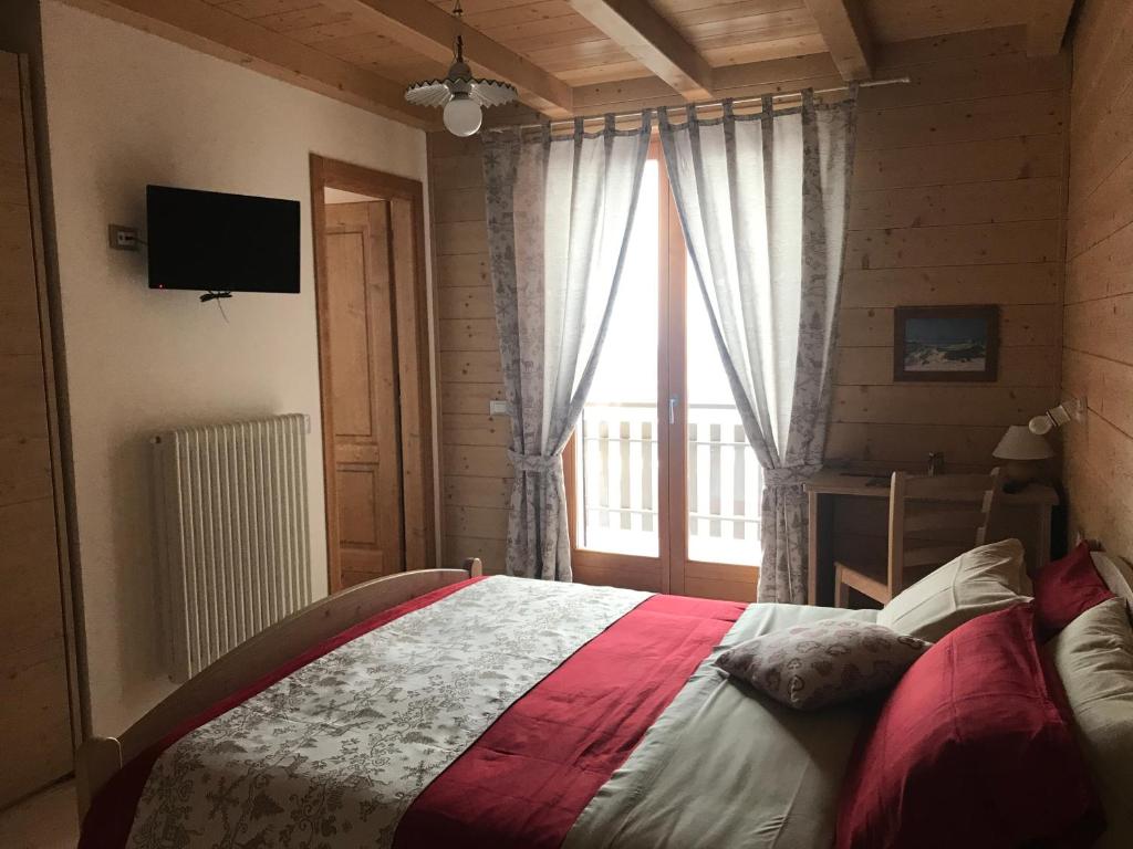 Łóżko lub łóżka w pokoju w obiekcie Locanda "Al Terrazzo"
