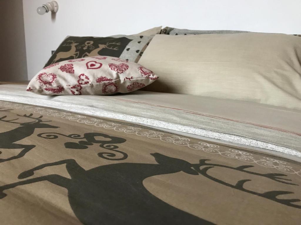 Łóżko lub łóżka w pokoju w obiekcie Locanda "Al Terrazzo"