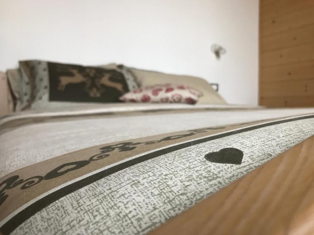 Łóżko lub łóżka w pokoju w obiekcie Locanda "Al Terrazzo"