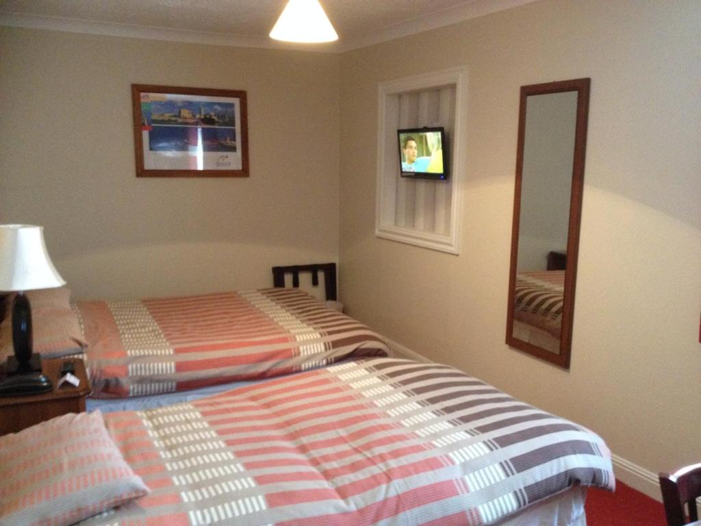 Letto o letti in una camera di Glendine Inn