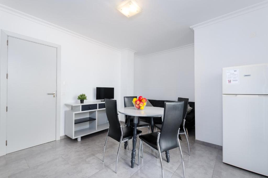 Kuchyň nebo kuchyňský kout v ubytování Alcudia Apartments