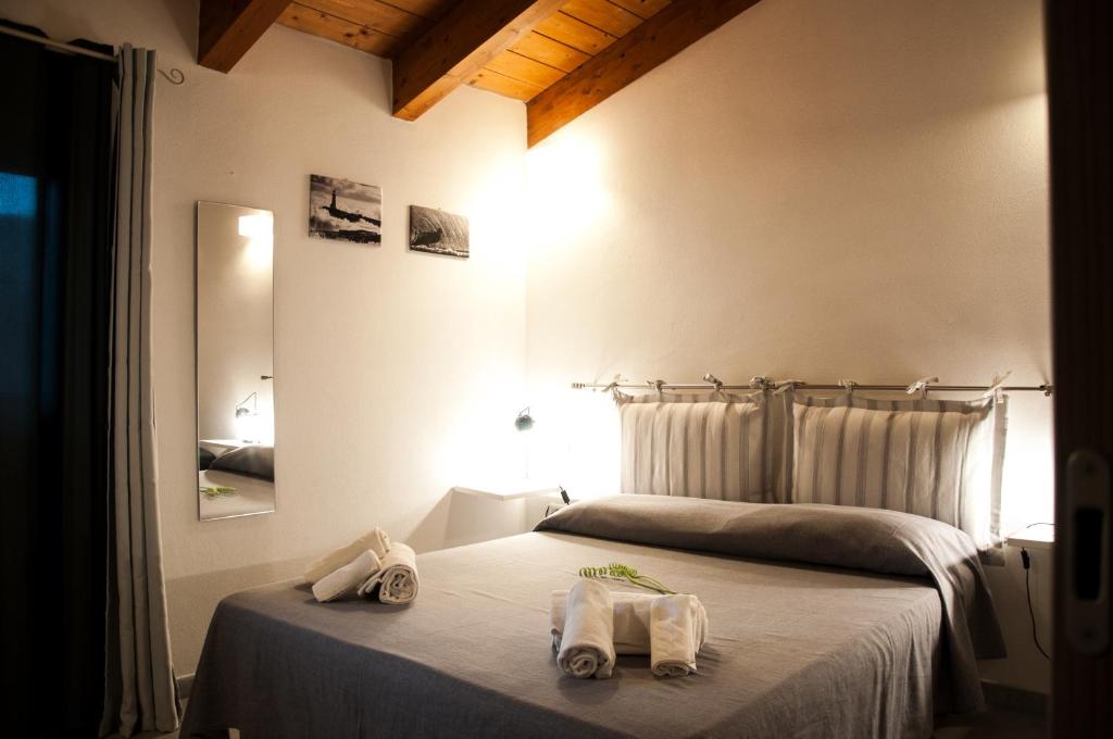 Postel nebo postele na pokoji v ubytování Alghero DeTRabis B&B
