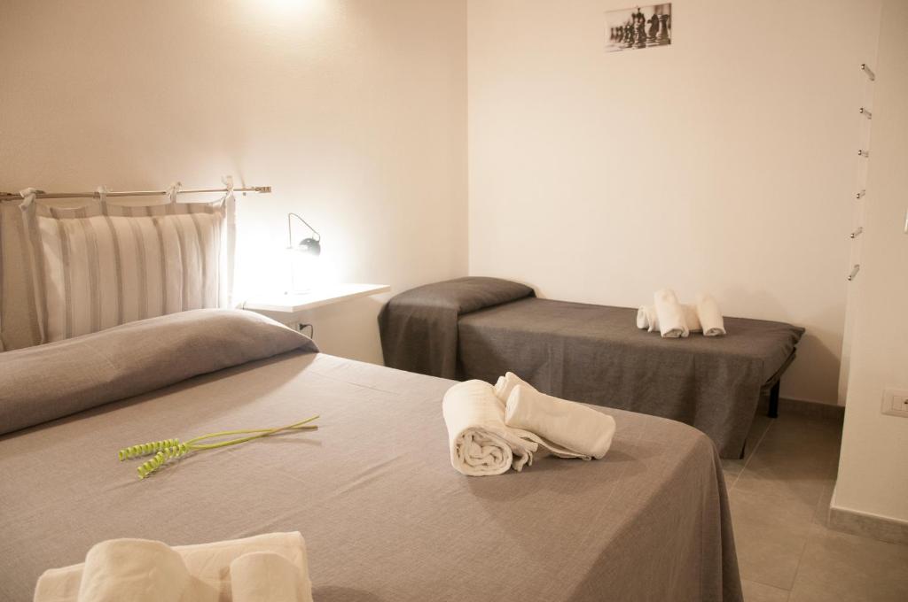 Postel nebo postele na pokoji v ubytování Alghero DeTRabis B&B