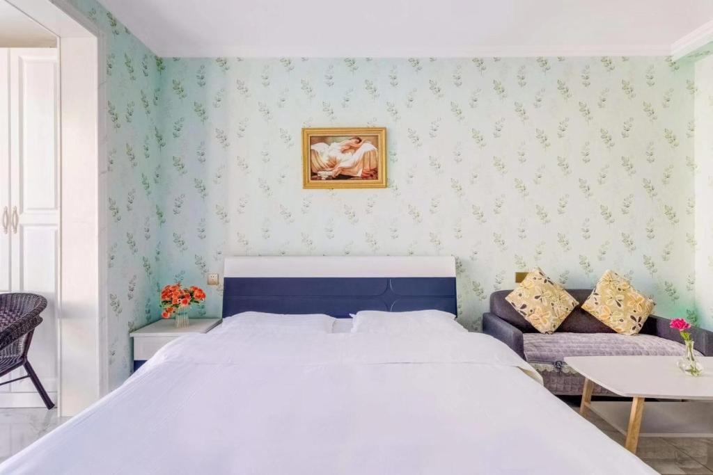 Letto o letti in una camera di Utopia Apartment