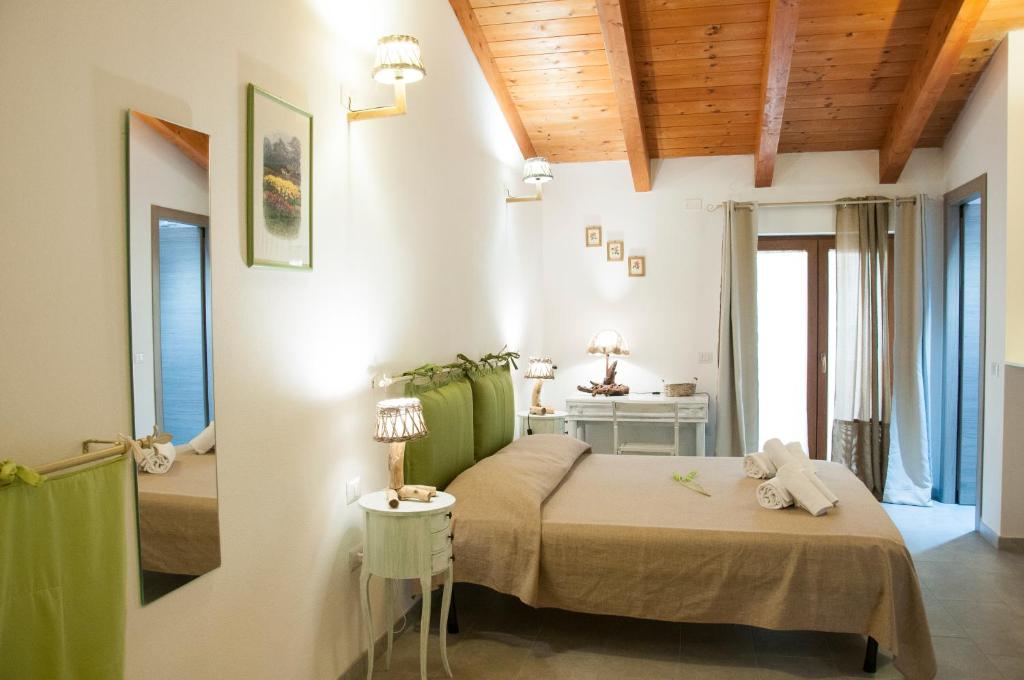 Postel nebo postele na pokoji v ubytování Alghero DeTRabis B&B