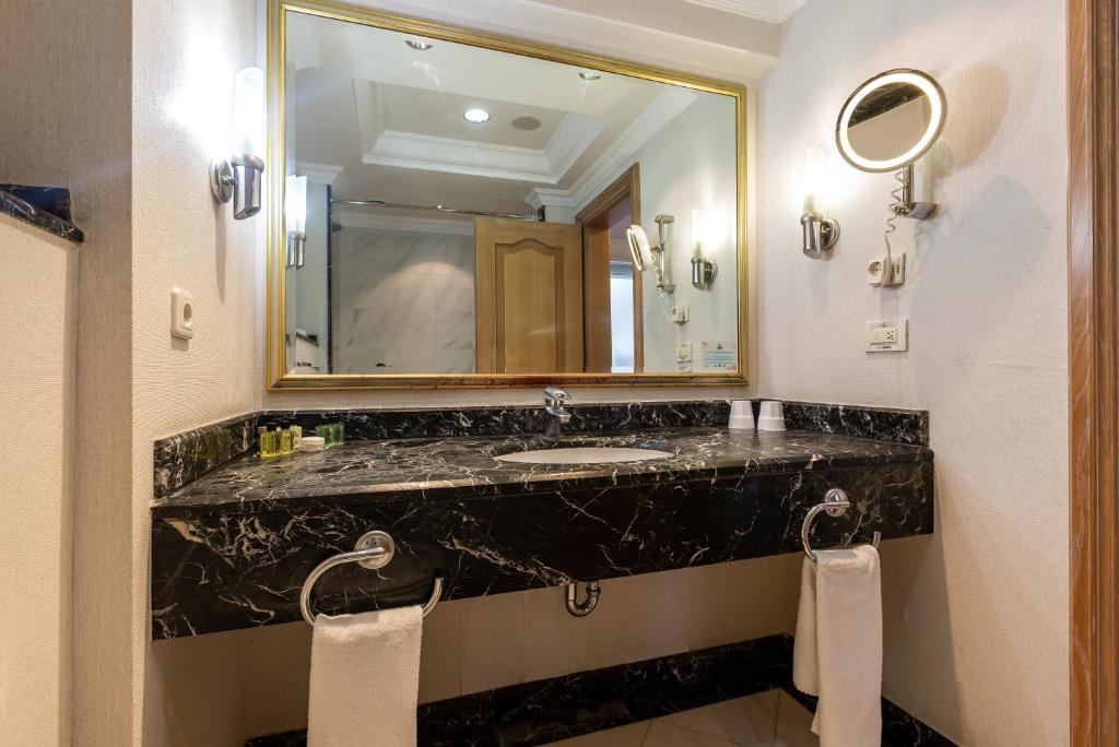 Koupelna v ubytování Simena Comfort Hotel