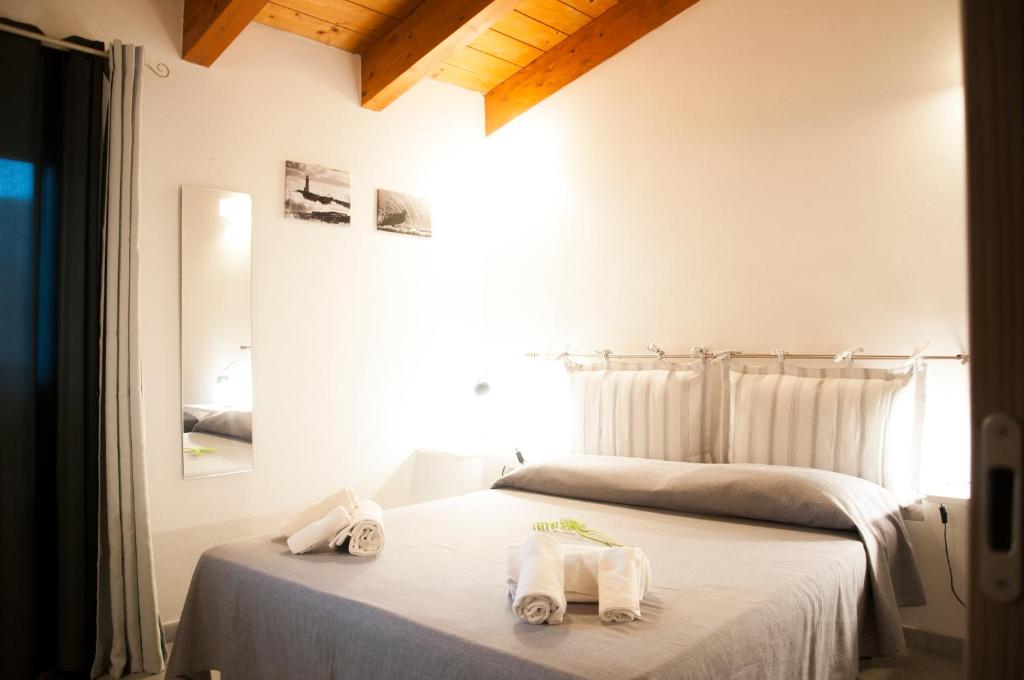 Postel nebo postele na pokoji v ubytování Alghero DeTRabis B&B
