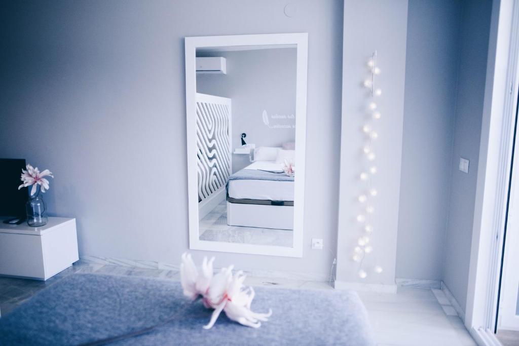 Postel nebo postele na pokoji v ubytování APARTMENT LA CALA DREAM & SEA VIEW