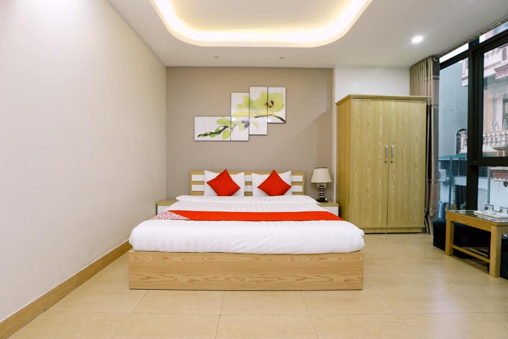 Postel nebo postele na pokoji v ubytování Tuan Anh Hotel