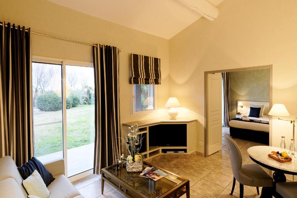 Posezení v ubytování Hôtel L' Estelle en Camargue