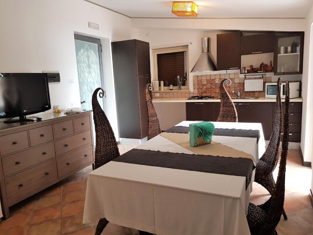 Kuchyň nebo kuchyňský kout v ubytování Hotel Vello d'Oro