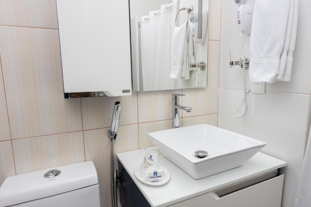 Koupelna v ubytování Nova Hotel