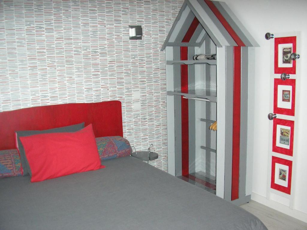 Postel nebo postele na pokoji v ubytování CHAMBRES D'HOTES