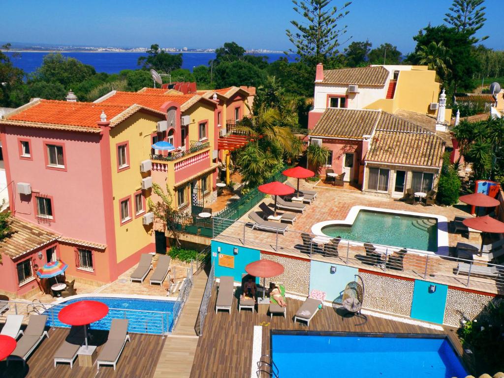 an aerial view of a house with a swimming pool at Villas D. Dinis - Charming Residence (adults only) in Lagos