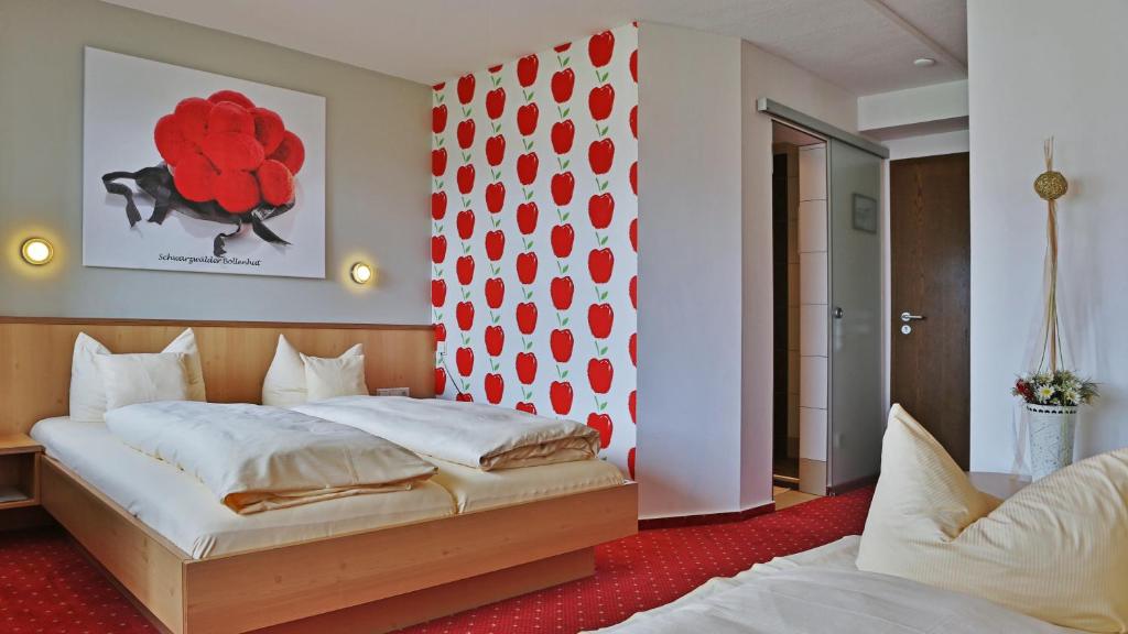 Postel nebo postele na pokoji v ubytování DEVA Hotel Renchtalblick