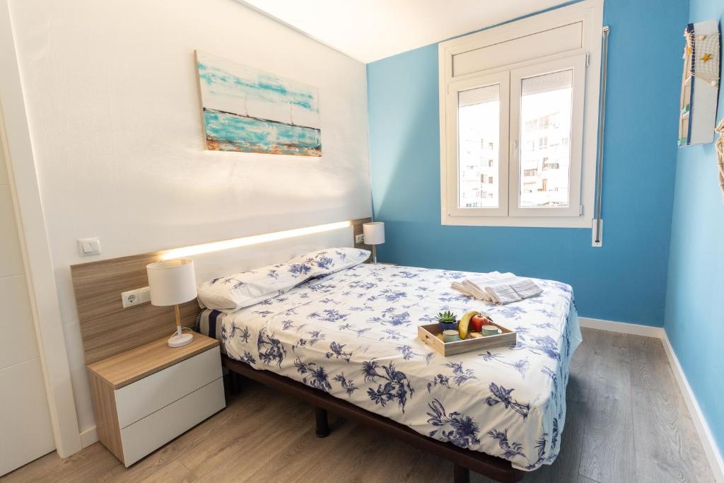 A bed or beds in a room at Tarrapolita_Rambla