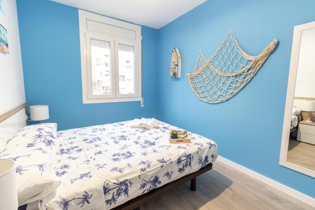 A bed or beds in a room at Tarrapolita_Rambla