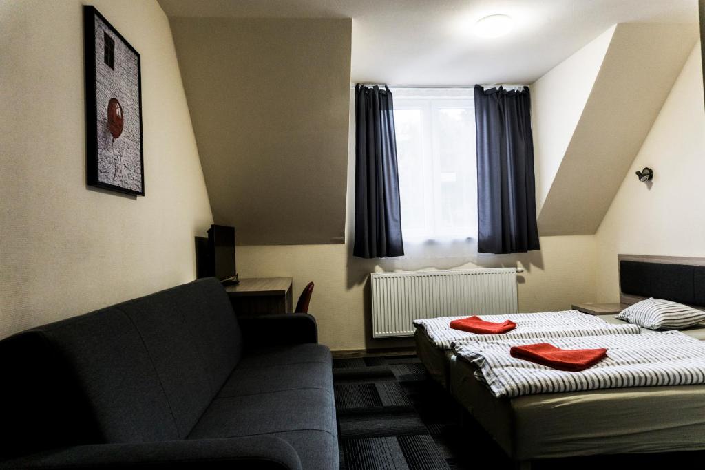 Posteľ alebo postele v izbe v ubytovaní dask resort