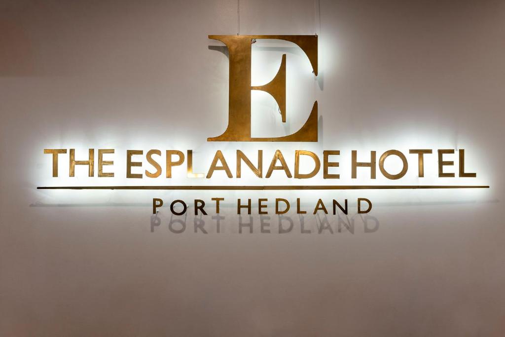 
The logo or sign for the hotel
