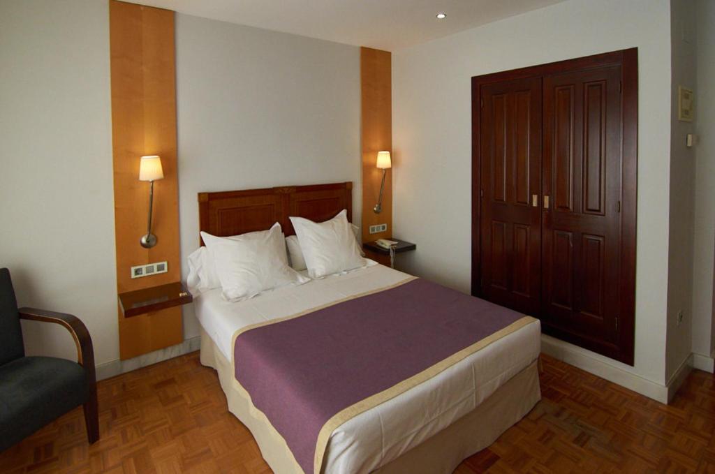 Cama o camas de una habitación en Hotel Don Curro