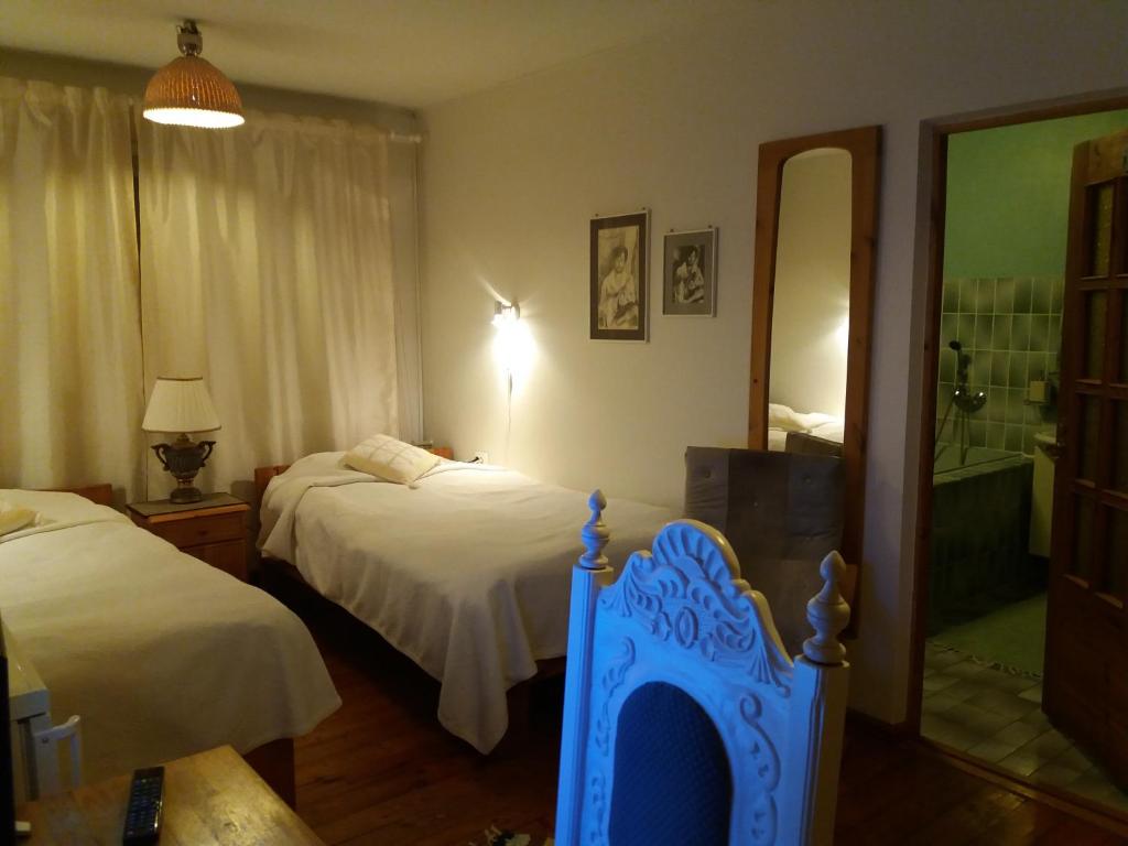 Postel nebo postele na pokoji v ubytování White Villa
