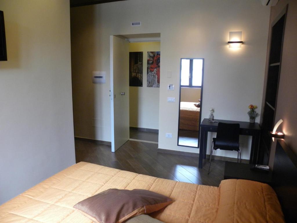 Posteľ alebo postele v izbe v ubytovaní B&B Il Campanile