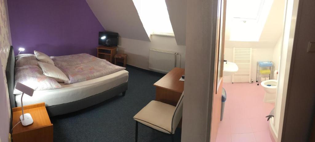 Postel nebo postele na pokoji v ubytování Penzion Jordán