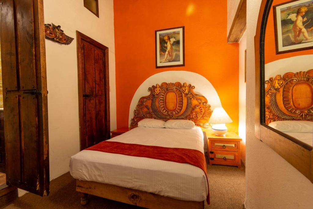 Postel nebo postele na pokoji v ubytování Hosteria del Frayle