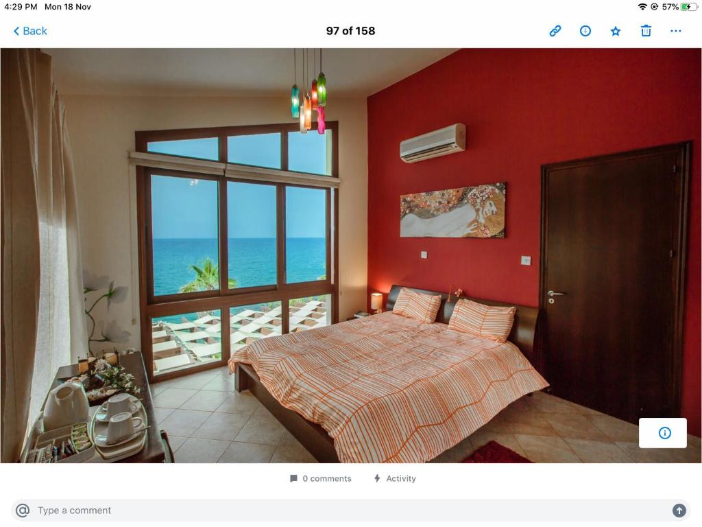 Postel nebo postele na pokoji v ubytování Kallinousa Beach Villa