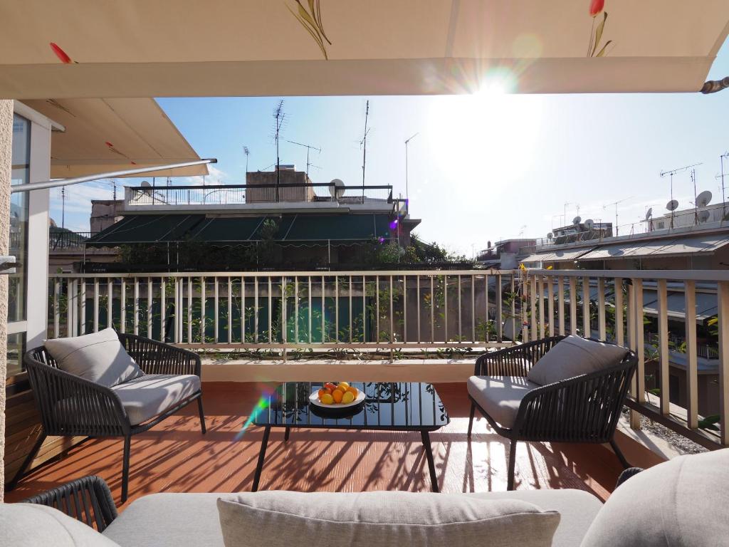 A balcony or terrace at Sophia's Penthouse Apartment With Jacuzzi and Acropolis View From Big Terrace