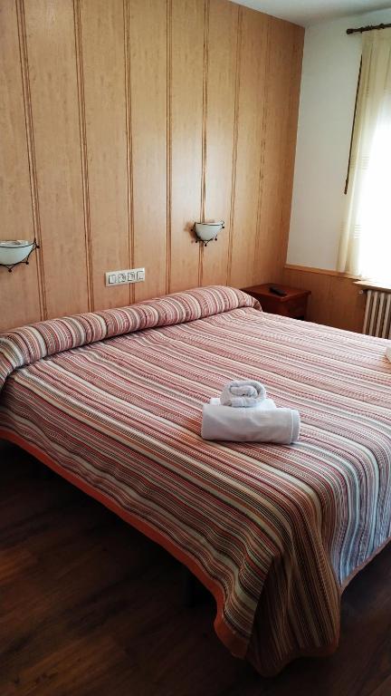 Postel nebo postele na pokoji v ubytování Hotel Rural Casa Ramiro