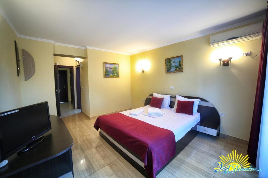 Postel nebo postele na pokoji v ubytování Hotel Diandra