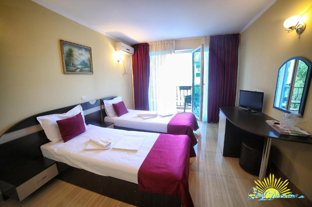 TV a/nebo společenská místnost v ubytování Hotel Diandra