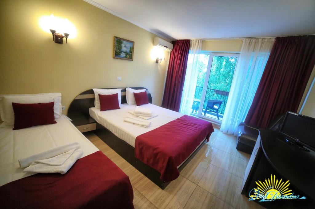 Postel nebo postele na pokoji v ubytování Hotel Diandra