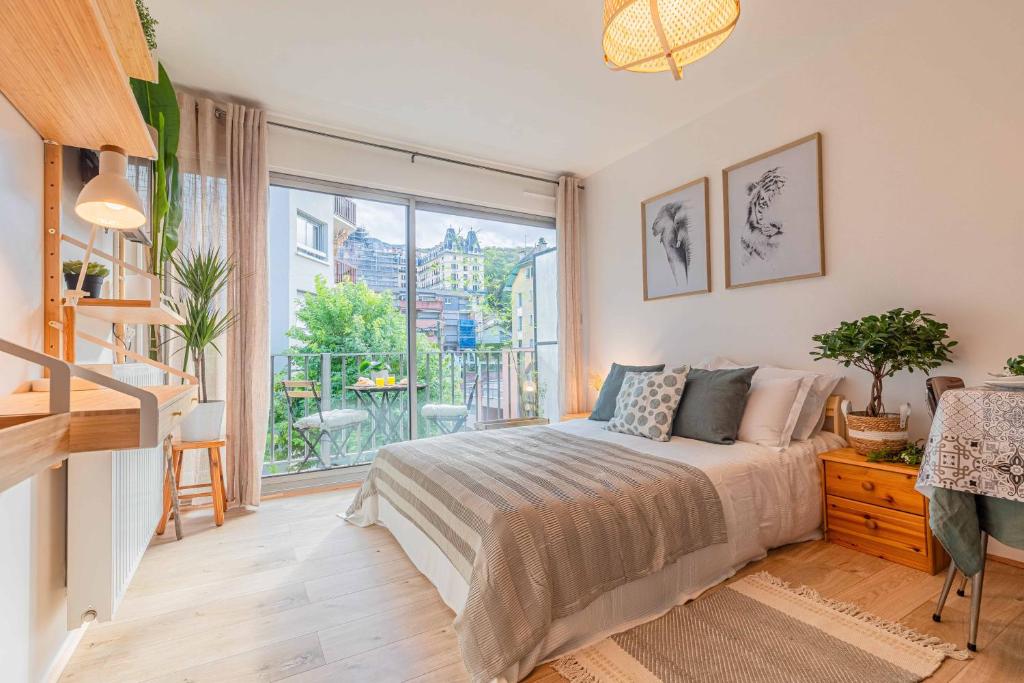 Ένα ή περισσότερα κρεβάτια σε δωμάτιο στο Studio Bali 2** + Parking Privé inclus