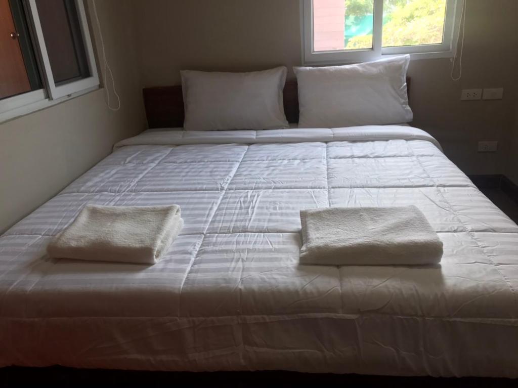 Postel nebo postele na pokoji v ubytování Aladdin Guest House