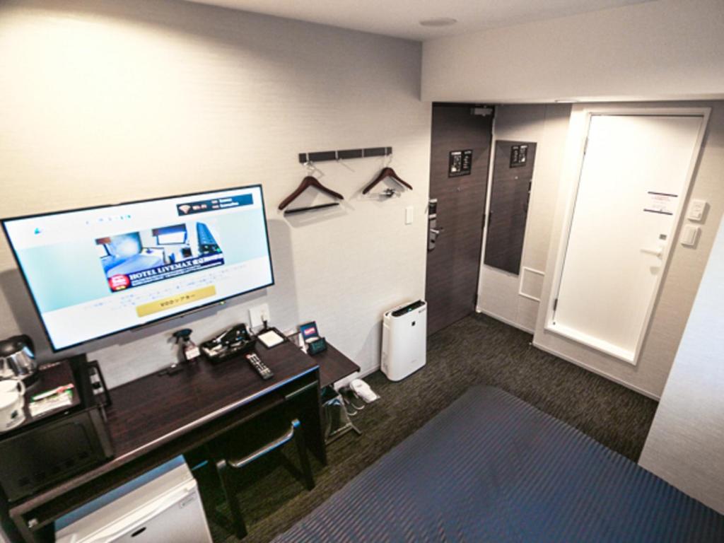 TV a/nebo společenská místnost v ubytování HOTEL LiVEMAX Tokyo Kanda-Ekimae