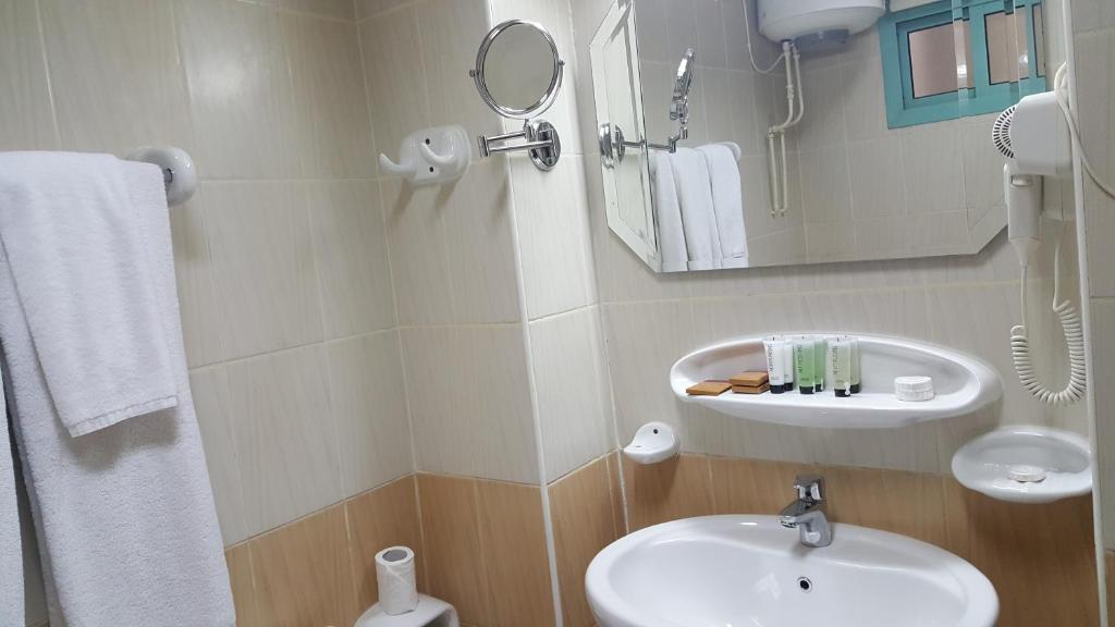 Koupelna v ubytování Al Muntazah Plaza Hotel