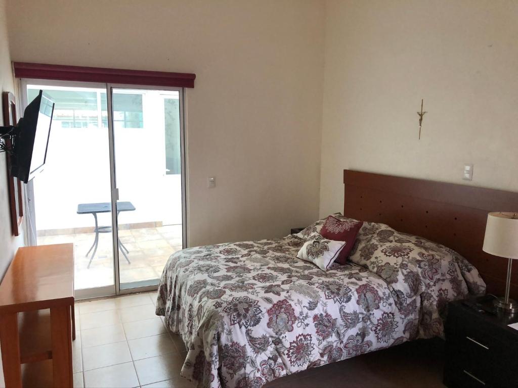 Postel nebo postele na pokoji v ubytování CHIFLON VILLAS