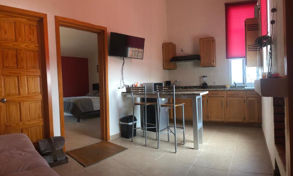Kuchyň nebo kuchyňský kout v ubytování CHIFLON VILLAS