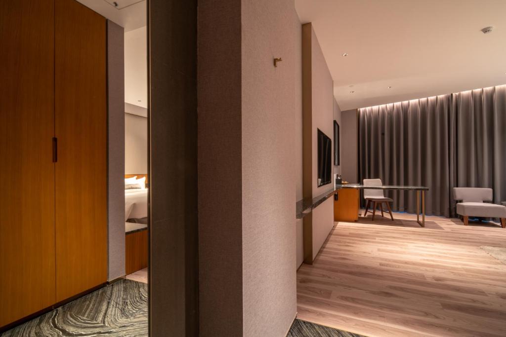 Postel nebo postele na pokoji v ubytování The Luzerne Hotel