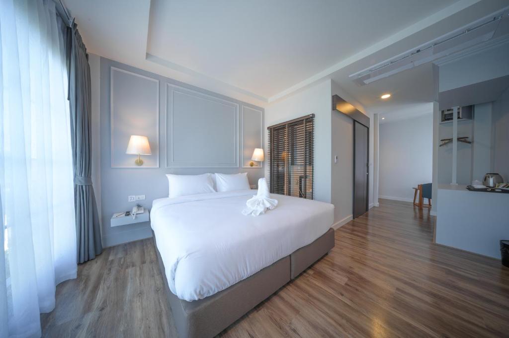The Wing Boutique Hotel - Deluxe King Room