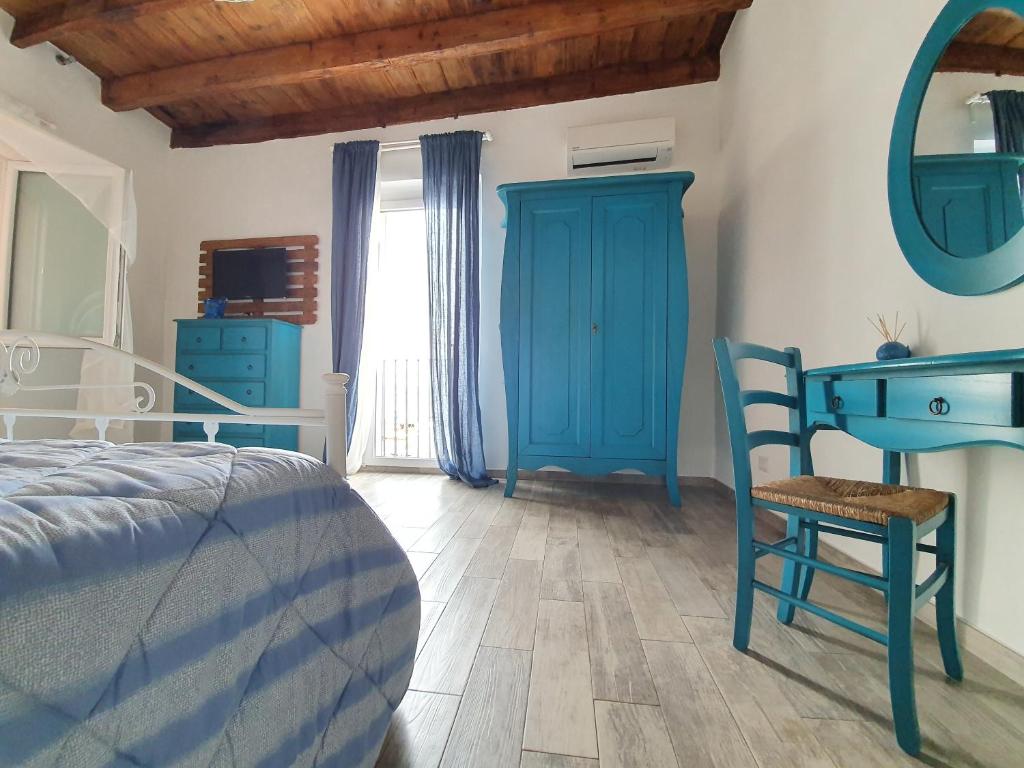 Postel nebo postele na pokoji v ubytování B&B La Terrazza di NonnAnna