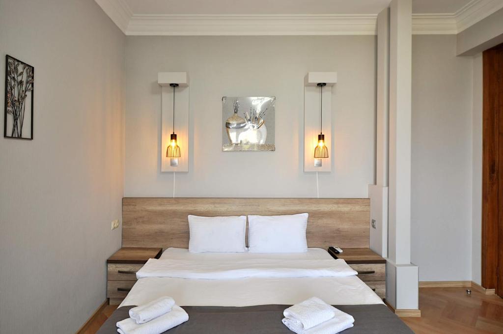 Postel nebo postele na pokoji v ubytování Hotel Livin