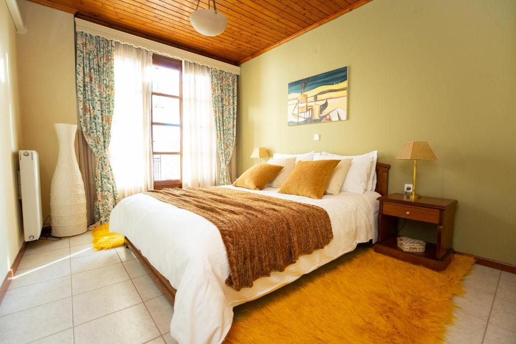 Postel nebo postele na pokoji v ubytování Apartment Kouros Delphi