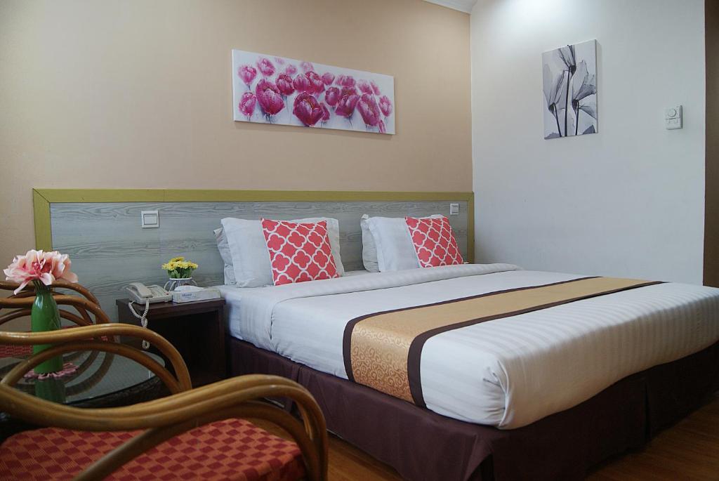 Postel nebo postele na pokoji v ubytování TD Plaza Hotel